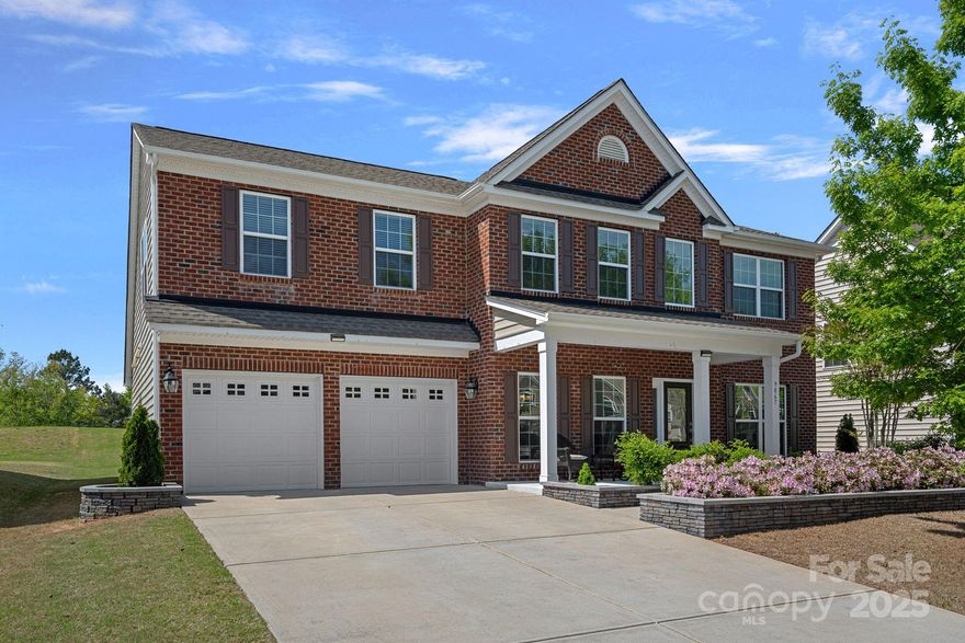 Welcome to this stunning 2-story home in the desirable Waterford on the Rocky River! Boasting 5 spacious bedrooms and 4 full bathrooms, this home offers the perfect blend of elegance and functionality. The beautifully landscaped front yard with stone bordering offers standout curb appeal. The main floor features engineered hardwood floors, formal living and dining rooms, and a guest bedroom with full bath. The open-concept family room, complete with a cozy gas log fireplace, flows seamlessly into the kitchen and breakfast area—ideal for entertaining. The kitchen showcases granite countertops, stainless appliances, and ample cabinet space. Upstairs, the 5th bedroom is wired for surround sound and projector—perfect for a home theater. Relax year-round in the screened-in porch overlooking the backyard.  Fresh paint throughout the entire home, including the garage, a whole-house water filtration system, granite in all baths, and an epoxy-coated garage floor complete this move-in ready gem!