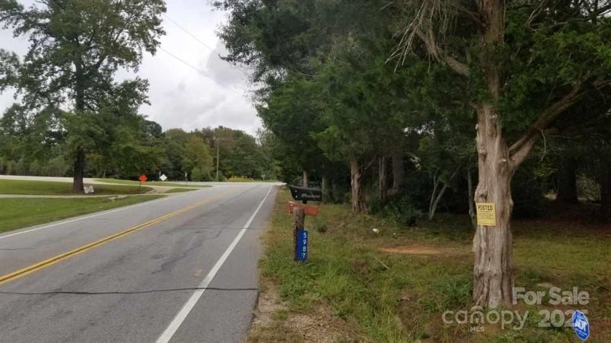 INVESTMENT PROPERTY - 2240' frontage on 4 lane on Hwy 521, 531 frontage on Steel Hill Rd, Once in a lifetime chance to buy, currently zoned residential - no HOA. Please note all interested parties must be accompanied by a Realtor. (PLEASE DO NOT DISTURB TENANTS)
Indian Land community, located one mile from the new Indian Land High School & adjoins Millstone Creek Subdivision, 14 acres +/- at corner of Hwy 521 (approx 2240 feet frontage) and Steel Hill Road (approx 531 feet frontage). 2 occupied rental homes on property (Appt needed to view)