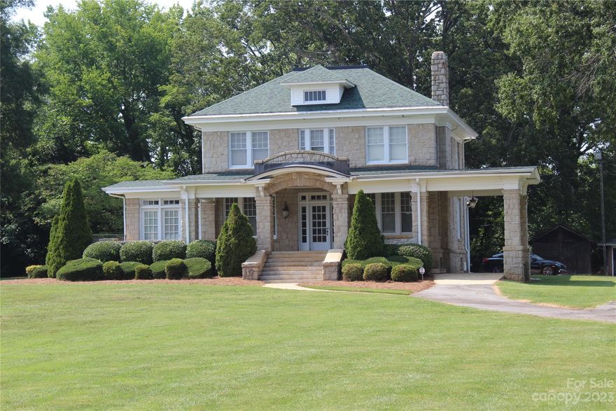 Fabulous property with a handsome stone building!  Lots of land - subject sits way off the road and has ample parking. Improvements consist of two buildings, Building 1 built approximately 1923 with +/- 3,930 square feet. Building 2 built around 1949 with +/- 1,825 square feet. Currently Building 1 is used for office purpose but was previously single family home. Building 2 is currently used for storage.