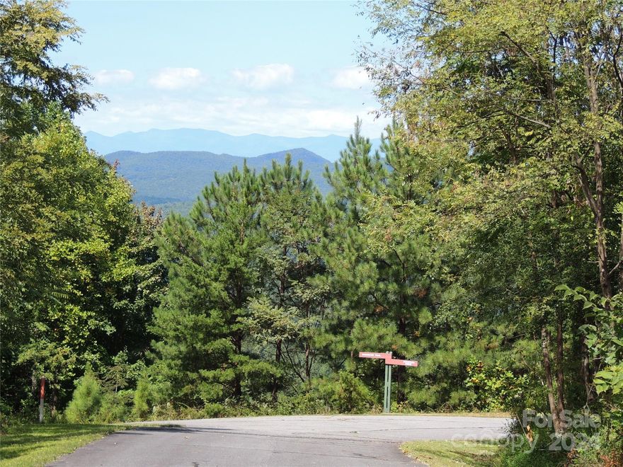 "OWNER FINANCING Available" Welcome to Yellowtop Mountain Estates. This Picturesque 0.92 ac building lot is cleared and ready for construction with a 425 ft deep well in place.  There is a septic permit for 3 bedroom home that expired in 2024. This lot is easy access and has Dramatic Year-round West Views. So much of the work is in place and ready for you to build.
The Yellowtop Community is a peaceful, quiet lifestyle for your primary or secondary home and located centrally between Asheville NC, Charlotte NC and Greenville SC a 1 &1/2-hour commute to airports, sports and shopping. Local towns of Forest City and Rutherfordton are about 15 miles away for Main Street Dining and Shopping.  Look over the pictures and enjoy the view.