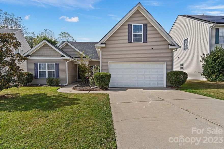 This BEAUTIFUL, 1.5 story OPEN concept home offers 1 primary suite, 2 well-appointed bedrooms, and 2 modern bathrooms on main level. 4th bedroom, loft, or office can take place of upper level bonus room. The kitchen boasts a contemporary aesthetic with NEWLY installed Quartz countertops, NEW microwave and stove. The kitchen island is a standout feature with bar-height setting. There is a formal dining area, and a generously proportioned living room featuring a vaulted ceiling and a cozy fireplace. The home has been Freshly painted providing a vibrant move-in ready feel. The front yard has an optional seating area, while the backyard offers a lush greenery backdrop. This home has a convenient two-car garage, adding to its overall appeal. NEW ROOF installed Aug 2023. Home has Leaf Guard. Buyers are welcome to keep washer & dryer. Home provides easy access to I-85, 485, and 77, enhancing your daily commute. PNC Pavilion, Concord Mills, Charlotte Speedway nearby. Schedule a showing today!