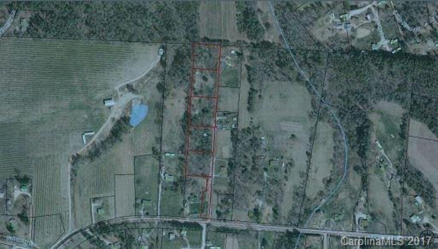 Developers! 4.08 +/- acres conveniently divided to accommodate your next development. No restrictions allow this property to have multiple possibilities. Well and 1 BR Septic is in place on lot #4.