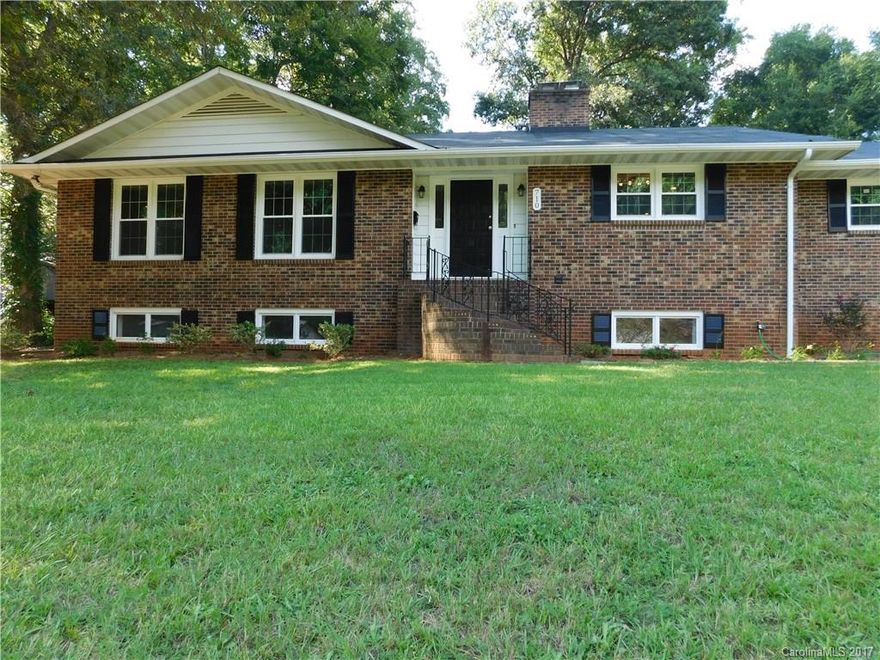 Beautiful brick ranch, ready with new energy efficient windows, gorgeous new kitchen cabinets, granite counter-tops, top of the line stainless steel appliances, with a downdraft range, LED can lights throughout, newly remodeled bathrooms, new tile, stunning wrap-a-round stone fireplace, and more!  Basement with full bathroom, and plenty of room for your to finish it however you want: new office/den, a perfect man-cave, more bedrooms, in-law suite, playroom,/game room, party room, etc...