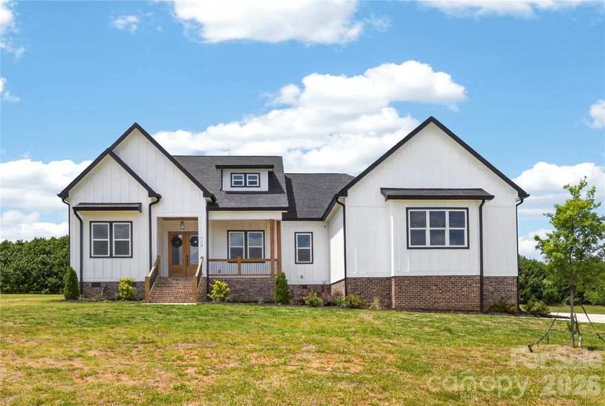 Professional pictures coming on Monday 5/11! Welcome to Deer Brook Country Club—one of those neighborhoods that just feels good when you pull in. Clean, quiet, homes with space between them, and no heavy HOA breathing down your neck.

This brand-new home offers 2,609 sqft, 4 bedrooms, and 3.5 baths, but what really makes it stand out is how easy it is to live in. You walk in and it just makes sense—good light, open layout, no weird wasted space.

The kitchen is set up for real life. Two-tone cabinets that give it some character, stainless steel appliances, plenty of counter space, and a walk-in pantry that actually holds everything without cramming. It opens right into the living area, so you’re always connected whether you’re cooking, hosting, or just hanging out.

The living space feels open but still comfortable—not oversized and empty, just right.

The owner’s suite has its own space and privacy, and the bathroom feels a step above with floor-to-ceiling tile, a clean modern look, and room to move around without feeling tight.

Upstairs gives you options—extra bedrooms, office, guest space—whatever you need, it works.

And the lot is where this one really separates itself—.59 acres. You’ve got a covered back porch plus enough yard to actually enjoy it. Space for gatherings, kids, or just not being right on top of your neighbor.

Deer Brook gives you that more upscale feel without the restrictions, and being in Shelby means you’re getting more house and more land for your money.

If you’ve been touring homes and everything feels the same, come see this one. It just feels different in person.