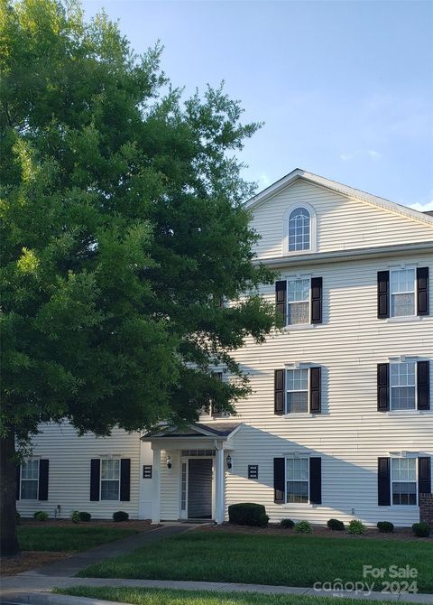 Photo of 4050 Town Center Road, Harrisburg, NC 28075 (MLS # 4144110)