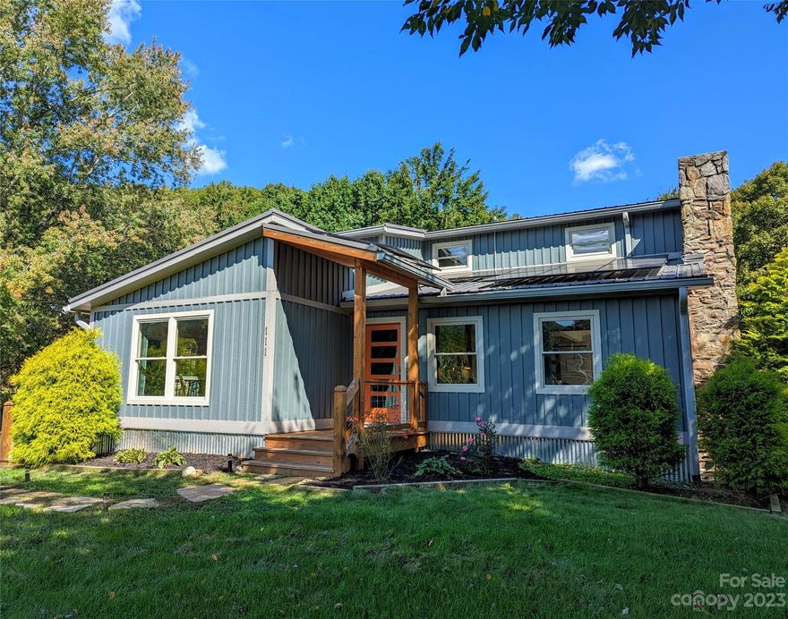 Let the Vision House be your new home!  Located in a quiet neighborhood in the Beaverdam Community, this home is just minutes from Asheville and Waynesville.  When you walk in the front door, you are greeted with an open floor plan with an abundance of natural light and beautiful views of the Smoky Mountains.  This 3 bedroom, 3 bath home has lots of space and is just waiting for your family.  Enjoy a bonus space on the main floor that could be a home office or your kid's game room.  This home has been completely remodeled and offers a main floor master bed/bath and laundry room.  Downstairs you will find tons of storage space in the basement as well as a spacious den and/or man cave.  So many features in this home, including solar panels! Your utility bill will be almost non-existent with you only having to pay a minimal monthly amount.  You don't want to miss this one!  

ADDED BONUS!!!  Seller is selling this home furnished!!