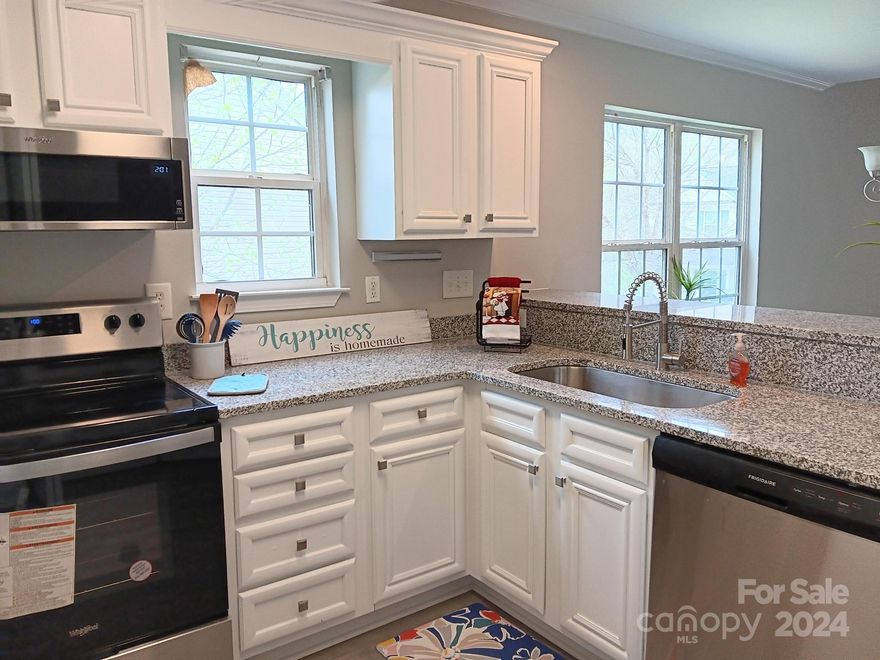 Perfect for First Time Home Buyers, Downsizing, etc. Award Winning Schools. Extensive Rehab Includes NEW: SS Appliances, 9" Undermount Sink, Granite Countertops with overhang bar stool sitting area, Cabinet Pulls, Luxury Vinyl Plank Flooring Throughout ( NO CARPET ), Vanities, Toilets, Designer Faucets, Mirrors, Lighting, Door Knobs, Hinges, Hardware, Supply Lines, etc. Also: Refurbished White Kitchen Cabinets with Soft Close Feature. Best Feature: New Gas HVAC, Gas Hot Water Heater/Expansion Tank, and Plumbing lines throughout by Licensed HVAC and Licensed Plumber..!! Window glass replaced where needed. Fresh Paint Inside. Too Much to List. NO PESKY HOA TO Deal WITH. Move In Ready..!! Pet Friendly. Fenced in Back Yard for Toto the Dog..!! Quiet Wooded Setting in Back. Potential Seller Financing with 150k Down. With most everything New this should be somewhat maintenance free.....Hurry..!!