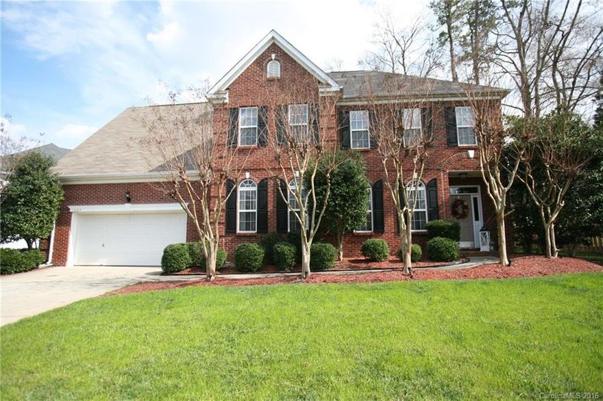 What a gorgeous home with a spectacular yard, perfect for entertaining.  Addition includes two rooms plus a full bath, front and rear staircases, and open floor plan make this a great home for anyone.  Formal living and dining, beautiful great room with fireplace and windows overlooking the patio and outside fireplace. This home has so much character!  Updated kitchen connects with large breakfast area with bay window, fantastic upstairs plan has huge master suite with bonus room and 3 bedrooms.