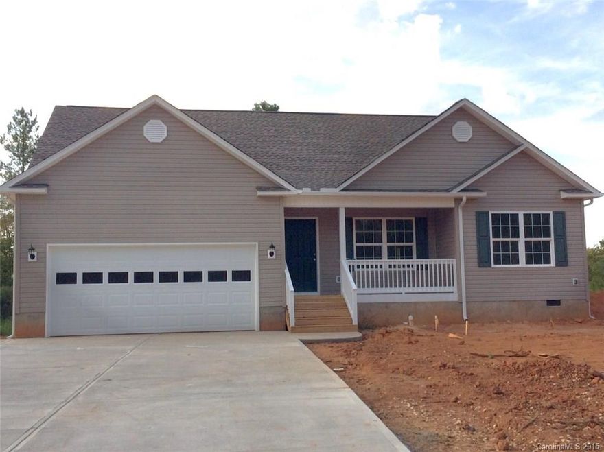 New Construction with granite countertops in kitchen and baths, hardwood flrs in main living areas and kitchen, covered back porch, and split bedroom plan on large 1 acre lot. Area qualifies for 100% financing through USDA
