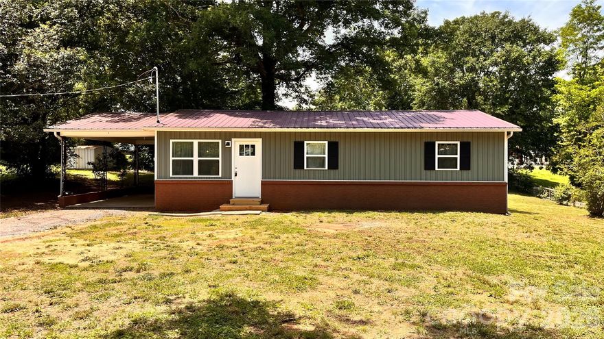 Budget friendly and Beautifully Renovated Home - Features ALL NEW windows, Doors, Vinyl siding, Kitchen Cabinets and Stainless Steel Appliances, a Fresh bathroom upfit, LVP flooring throughout, with updated HVAC, Electrical and Plumbing. This Home offers 3 bedrooms with ample closets and an open concept living, dining, and kitchen area all trimmed for a modern country look. Outside the backyard has a small fenced in area and 3 outbuildings for plenty of storage. All this is tucked away on .34 acres minutes from Downtown Lenoir and the Cajah's Mtn Community.