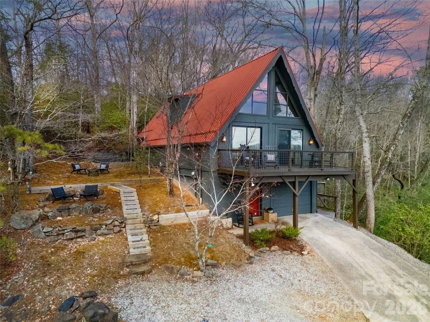 Charming 2-bedroom, 2-bath A-frame retreat with stunning mountain views, perfectly suited as a private getaway or income-producing rental property. This unique home offers the cozy character buyers love, paired with six years of proven rental history — making it a turnkey investment opportunity.  Soak in the scenic surroundings from the hot tub after a day of exploring, or relax and unwind in the inviting living space designed for comfort and connection. The thoughtful layout provides privacy and functionality, ideal for guests or owners alike. 
Conveniently located just inside the Walnut Hollow gate, this property offers both accessibility and a peaceful mountain setting. For added ease, the current owner is willing to remain on as property manager, creating a seamless transition for investors. Don’t miss this opportunity to own a fully established mountain retreat with income potential and breathtaking views.  Connestee Falls is a beautiful gated community in Western NC Mountains featuring 4 mountain lakes, 20 plus miles of private hiking trails, a 26,000 square foot clubhouse with multiple restaurants, and a championship 18 hole George Cobb designed golf course.  Schedule your showing today and come see why we live where we play! New buyer to Connestee Falls pays a one time Amenity Reserve Fund fee of $14,500 paid at closing.