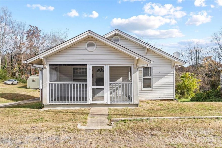 Welcome to 412 Wilson St NW situated in the Foothills of Lenoir, NC.  Whether you are an investor or first time homebuyer this home is a great opportunity for you.  This charming 3-bedroom, 1.5 bath home features a comfortable living room, separate dining room and a functional kitchen.  The 3 bedrooms provide for a  primary, guest room or office space. Enjoy your morning coffee on the enclosed screened in porch. Unwind in the evenings on the deck-perfect for grilling, relaxing or hosting friends.  Conveniently located just minutes away from uptown Lenoir, shopping and restaurants.  Enjoy easy access to the mountains with Blowing Rock and Boone only about 30 minutes away for a great weekend getaway.