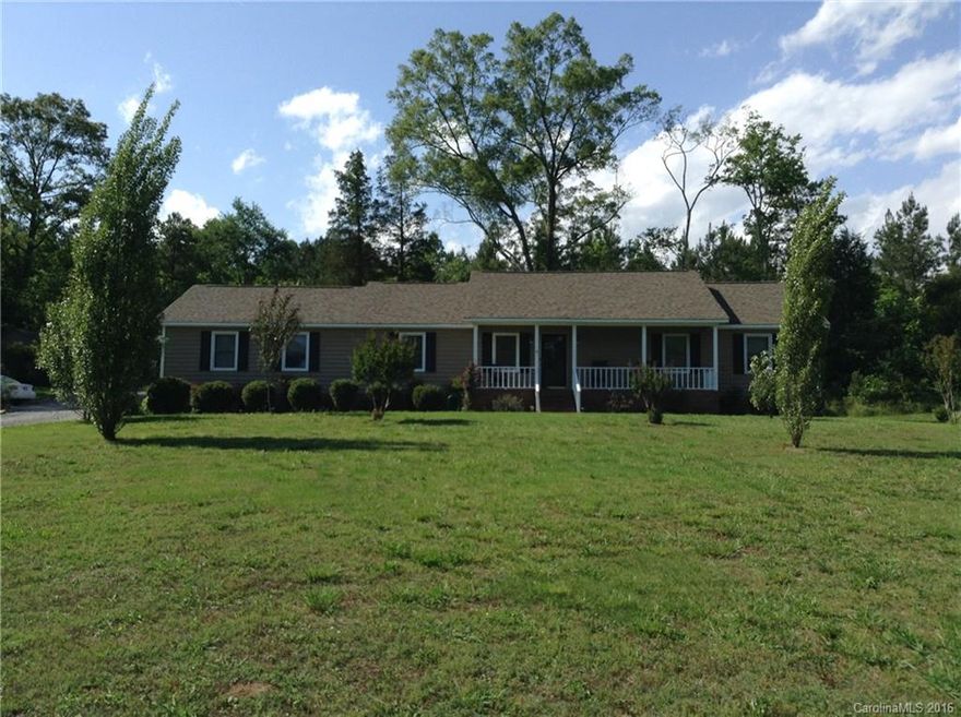 Location, land to roam, rustic style ranch and a great family house. Wonderful neighborhood. So many upgrades, sealed crawlspace, warranty with house, newer kitchen recently (GORGEOUS), fresh paint in BR's. Men will love the large workshop with workbench/storage and attached 3 car carport, house also has attached 3 car carport. Take a look and see how you could be living.
