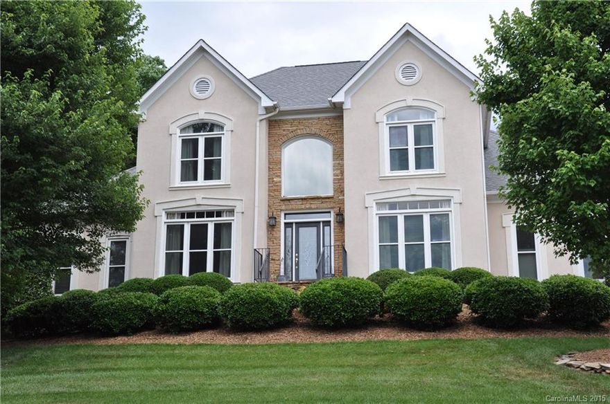 Gorgeous home w/ Brazilian Cherry flooring, master on main, remodeled MBath & kitchen w/ stunning granite CT & back splash, 50" flat screen TV in great room & 32" flat screen TV in master to convey, back yard oasis w/ large covered porch, patio, pool, and outdoor fireplace w/ gas logs. Over sized 3 car garage w/ built ins & side storage wired for ice-maker.  Extra drive area for privacy and convenience.  Desirable Piper Glen & Ballantyne location. Seller is NC licensed Real Estate agent.