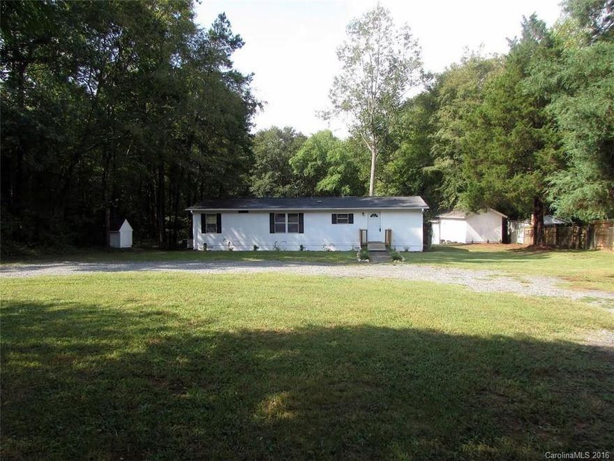 Why pay rent? Home ownership begins here! Offering 3BR/2BA well maintained double wide with split bedroom plan, new carpet, spacious living room w/ gas logs, storage building, one acre lot, and amazing Clover School District.