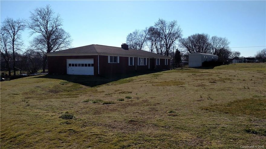 55.539 Acres with 2 homes and 2 mobile homes on it with 13 septic tanks on site, shared well.  This property could be subdivided for potential subdivision.  Please contact listing agent for details.