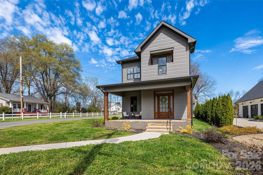 Discover modern living in Belmont—a beautifully designed new construction home with NO HOA and high-end finishes throughout. Ideally located less than a mile from the Catawba River, Kevin Loftin Riverfront Park, the Belmont Recreation Center, and the shops and dining of East Belmont, this home combines convenience, recreation, and small-town charm.

The open-concept main floor is perfect for entertaining and everyday living, featuring a spacious living room with an electric fireplace and a designer kitchen with a waterfall granite island, soft-close cabinetry, and a large pantry with built-in shelving. A convenient half bath and drop zone off the back entry add everyday functionality to the main level.

Upstairs, the thoughtfully designed layout offers a private primary suite with a large closet and custom built-in shelving, separated from the secondary bedrooms by a spacious laundry room with built-in hanging and hamper space. Both secondary bedrooms have direct access to the full secondary bathroom.

Additional highlights include no carpet throughout, modern ceiling fans in every bedroom, and stylish touches like a shower niche for everyday essentials. Bright, modern, and move-in ready, this beautifully crafted home is ready for its first owners.

Schedule your showing today and experience the best of Belmont living!