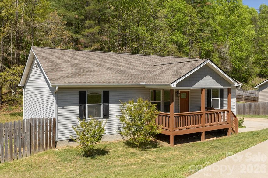 I am a younger, open, one level, split floor plan, accessible home with modern appliances and gladiolus that bloom in multiple colors! You have your choice to sit on my front porch and back deck while you have your morning coffee, grill out, host friends and family or sip a cool crisp Diet Coke in the afternoon. I have a nice, tall fence surrounding me that loves to keep your furry friends safe! You gotta check me out today! With ample parking, a primary suite, nice sized bedrooms, dedicated laundry space, a huge pantry off the kitchen and great closet storage, theres not much more you could ask for. Also, did I mention I’m down where Leicester highway is still two lanes? What you know about that? It’s nice and quiet with a little country! Come see me today!!