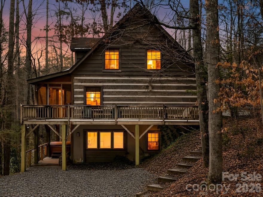 Tucked into the natural beauty of Black Mountain, this custom log cabin is the kind of property that checks every box; lifestyle, privacy, and income potential. An established short-term rental with years of proven income history with hot tub and game room.  This is truly an investor’s dream, or the perfect hybrid property for someone who wants to enjoy mountain life while their investment works for them. Step onto one of the peaceful porches and unwind to the serene sounds of Rush Creek flowing nearby. Whether it’s morning coffee wrapped in a blanket or evenings under the Carolina stars, this cabin delivers that authentic mountain experience buyers crave. The custom log construction brings warmth and character, blending rustic charm with comfort that's the kind of place guests return to year after year. An additional .70-acre adjoining lot is included, creating a natural buffer of privacy and long-term value. Extra space. Extra protection. Extra potential.  Cabin is being sold fully furnished and has a whole house generator.  Just bring your toothbrush and hiking boots!