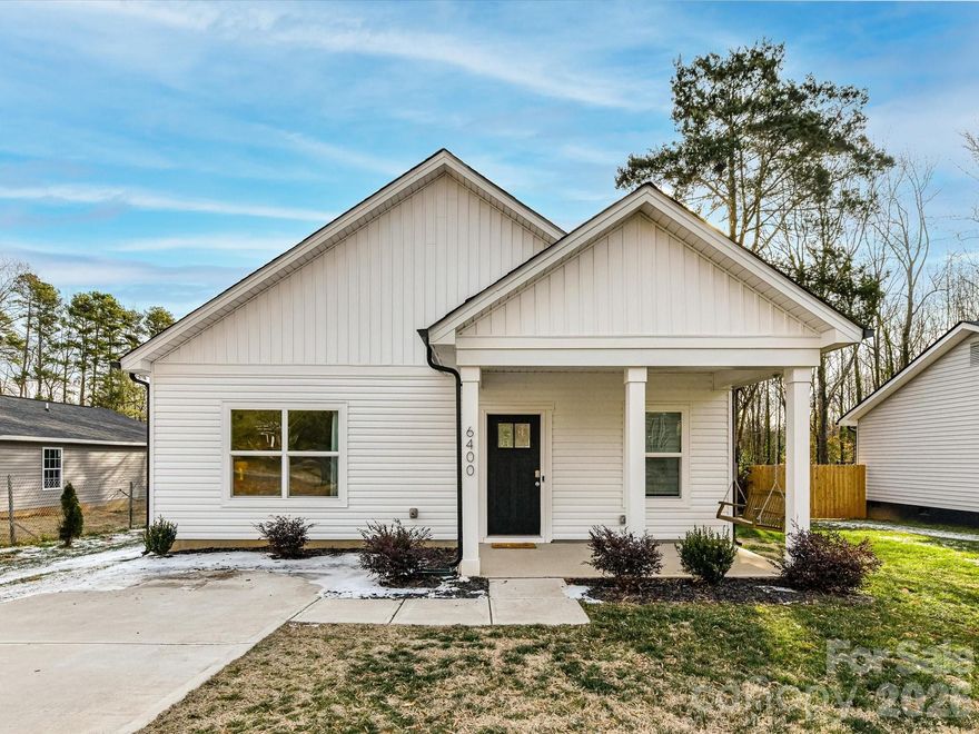 Located on a half-acre lot in Rockwell Park, this contemporary ranch is the definition of turn-key living. The interior is defined by tall ceilings and an abundance of natural light that highlights a functional, open layout. At the heart of the home, the main living space seamlessly connects the living room and dining area to a chef-inspired kitchen featuring a central island with seating, granite surfaces, pantry closet, and soft-close cabinetry. Premium finishes throughout include Pella windows, luxury vinyl plank flooring, and stainless steel appliances. All three bedrooms are generously sized, including a primary suite with an ensuite bath and a walk-in closet. Backyard is fully fenced with a concrete patio, the perfect footprint for summer BBQs or an outdoor lounge under the stars.

Enjoy the privacy of a sprawling lot while being in a geographic "sweet spot" in North Charlotte - minutes from Uptown, NoDa, UNCC, and Truliant Amphitheater (formerly PNC), no HOA, with the neighborhood park just .2 miles away. For those seeking an effortless transition, there is an option to purchase the home fully furnished via a separate bill of sale - inclusive of all bedding and home goods. This package also includes professional photography and creative assets for an immediate rental launch, making it a perfect fit for a move-in-ready sanctuary or a versatile investment. This property qualifies for up to $10k closing cost incentive through the preferred lender. This is a rare opportunity for a truly seamless move. Pack your bags; don’t miss this rare opportunity! Call the listing agent today for a showing.