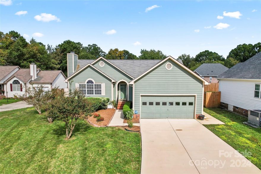 Welcome Home to 1042 Stirrup Place NW - the perfect 3BR/2BA home sitting on private cul-de-sac with fully fenced backyard in Cabarrus County. Home has been updated throughout! Home boasts new vinyl flooring, freshly painted walls, new painted kitchen cabinets, new blinds, new black door/hinge hardware! Large family room with beautiful natural light at all times of day makes this home comfortable and welcoming. Kitchen features plentiful cabinets with new hardware and newer appliances! 2-Car Garage with brand new concrete driveway! Primary bedroom features large walk-in closet, new shower with tile, and newly refinished dual vanity! New blinds throughout home! Venture outside to your private and fully-fenced backyard, through the screened porch perfect for relaxing and enjoying the nightly sunsets! Home is very quiet and peaceful. Additional sitting room off of kitchen is perfect for a play room, additional living room, office space, or flex room!