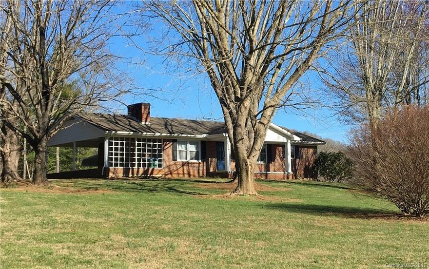 Not available for rent. South Asheville brick ranch with full basement! Beautiful 1.67 acre park like setting with mature trees and lovely mountain views. Home is immaculate and wonderfully maintained. Hardwood floors in hallway and bedrooms, new heat pump and hot water heater. Gorgeous remodeled bath on main level and the basement has a full bath not counted in square feet. Basement can be easily finished for additional square footage.