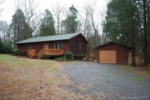 This 1176 square foot single family home has 2 bedrooms and 1.5 bathrooms.  The home has a detached building and a lovely yard.