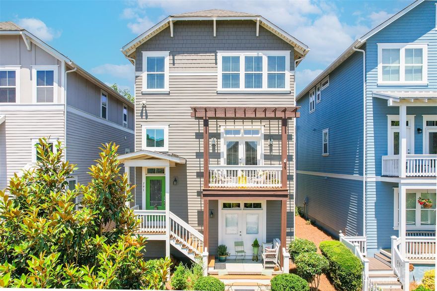 Welcome to the "tree house" with seasonal water front views and FOUR outdoor entertaining areas. Sitting high in the trees, this home beams with natural light through the front and back of the home.  This Saussy Burbank built home offers beautiful hard wood floors, custom trim and built-ins throughout. Enjoy having TWO primary Ensuites, one through the ground floor entrance and one on upper floor. The main floor provides a great space for entertaining with an open floor plan, a large screened in porch off of the living room and a balcony porch off of the dining room in the front! The spacious kitchen offers granite counters, subway tile backsplash and a large breakfast bar. Upstairs there are 3 full bedrooms and 2 bathrooms. The primary ensuite has direct access to another large porch where you can enjoy the views! This home has been meticulously cared for.  Enjoy Riverwalk living with new outdoor pool, river access, walking trails and SO many more amenities.