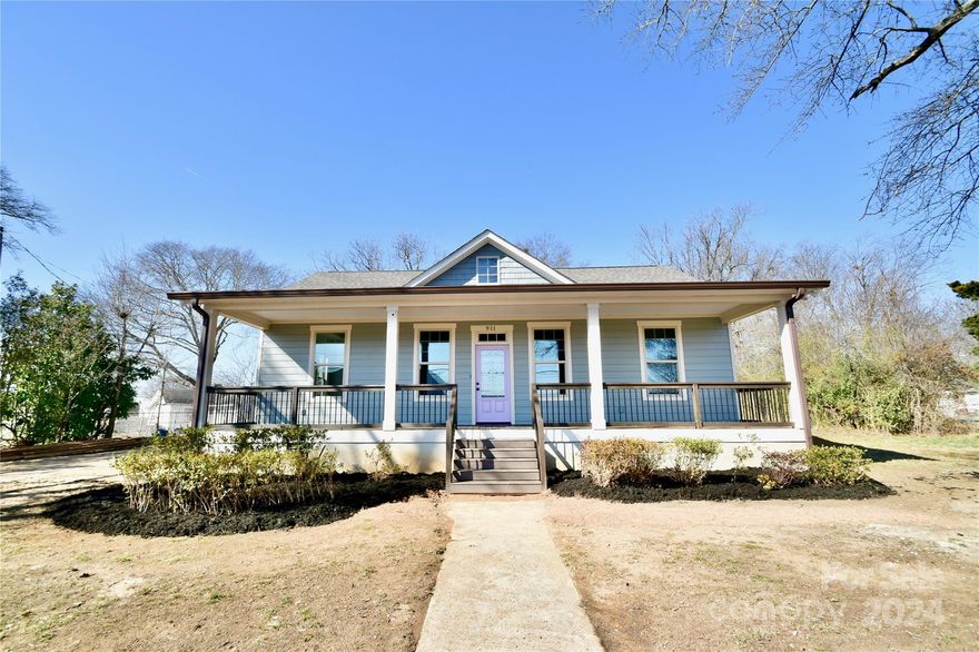 Come see this completely revamped cottage home featuring soaring ceilings throughout, a split open floor plan & huge covered front porch. Walk inside & discover for yourself just how light, airy, & open are the spaces within, each bordered by large encased windows, 10-inch crown molding & baseboards, & luxury vinyl planks running throughout the home. The kitchen is visible from the entry & is quite the delight w/ high end appliances, designer featured wall, quartz countertops, & soft close cabinetry. The principle bedroom suite has a tray ceiling, walk-in shower surrounded by custom tilework, a beautiful double vanity, & two walk-in closets w/ custom shelving. The secondary bedrooms are separated by a second full bathroom. Each has high ceilings & plenty of closet space. The secondary bathroom is also elegantly finished with new vanity, tub-shower combination, and beautiful tilework. This house is truly pleasant to the eye & offers wonderful feng shui... just come see for yourself.