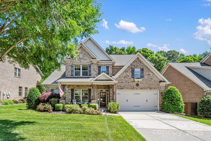 Welcome to this beautifully maintained home in the sought-after Barber Rock community! Crown molding and a coffered ceiling add charm to the open-concept layout—perfect for entertaining. The gourmet kitchen features a gas cooktop, expansive island, and ample cabinetry. The main-level primary suite offers a spacious layout with a luxurious en-suite bath and walk-in closet. Upstairs are three additional bedrooms with generous closets, two full bathrooms, and a versatile bonus room that can serve as a fifth bedroom or recreation space, with plumbing for a wet bar. Enjoy outdoor living on the screened porch overlooking a beautifully landscaped yard with hardscaping and a firepit. The garage includes an epoxy-finished floor for added durability. Additional features include two smart thermostats for comfort and efficiency. Community amenities feature a pool, clubhouse, playground, and recreation areas. Ideally located near Indian Land, Fort Mill, and Ballantyne - don't miss this one!
