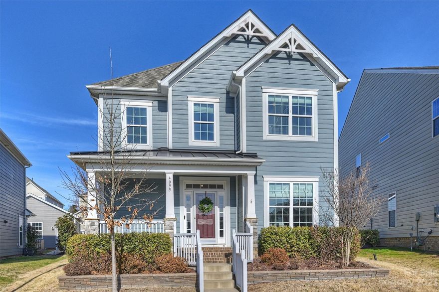 Welcome to this stunning home that seamlessly blends comfort, style & functionality.  As you approach, the covered front porch invites you to relax & enjoy the outdoors.  In the back, a covered screen patio, connecting to a detached garage, provides a private & sheltered space to entertain or unwind.  The kitchen has stainless appliances, custom gray cabinetry, beautiful light fixtures, & granite countertops.  The primary bedroom is on the main floor & is flooded with natural light.  The attached primary bath is a luxurious oasis, featuring a garden tub, walk-in shower & a spacious walk-in closet.  Upstairs, discover three spacious bedrooms & a versatile bonus room.  This home has been thoughtfully upgraded with new carpet, custom blinds, & fresh paint throughout the home in neutral colors. Garage has brand new epoxy floor covering & custom slat wall on one side, including all the hooks & attachments.  Fenced & landscaped backyard complete the picture! See agent remarks for schools.