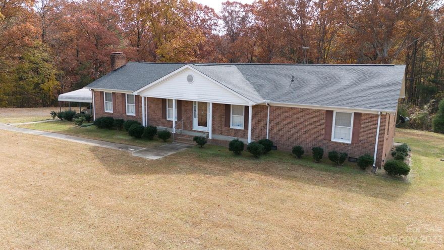 Welcome to your dream home nestled on 3.7 acres of picturesque landscape in the heart of Richburg, SC. This charming single-story residence boasts 3 bedrooms, 2 baths, and a spacious 2,222 square feet of living space. Crafted with timeless elegance, the exterior showcases a classic all-brick facade, ensuring durability and a touch of sophistication.
Step inside to discover modern luxury vinyl plank (LVP) flooring throughout. The sunken living room with exposted beams adds a unique architectural touch, creating a cozy and inviting atmosphere for family gatherings or entertaining guests.
Outdoor living is a delight with an expansive deck at the rear, perfect for enjoying sunny afternoons or hosting barbecues. The outbuildings on the property can be used for whatever your needs may be, and the stream at the rear adds to the natural beauty.
This property not only provides a comfortable dwelling but also a tranquil escape.