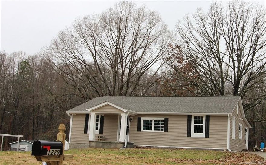 Country living close to everything and completely renovated for you!  Brand new chef’s kitchen with beautiful cabinets and granite counters plus new appliances, including washer and dryer.  You’ll love the engineered wood floors throughout, new jack n jill bath with granite counters.  2 beautiful acres with historic trees and only 10 minutes to Rock Hill and 40 to Charlotte.