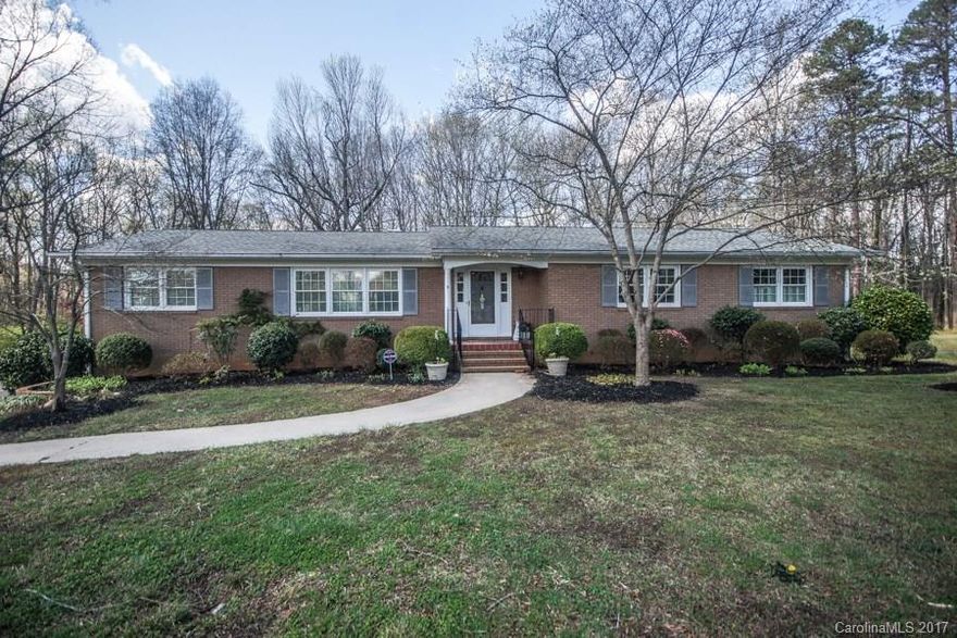 Very nice updated ranch/basement, open floor plan w/great room, dining room, keeping room off kitchen w/ new appliances.  Double oven &  tile back splash.  This home has new laminate & refinished hardwood floors.  Updated light fixtures & new bath fixtures.  This house also includes an in-law suite downstairs completed w/ kitchen, full bath and den & br area. 2.2 acre private lot and plenty of room for outdoor activities.  There is an over-sized deck, circle drive, and plenty of parking.