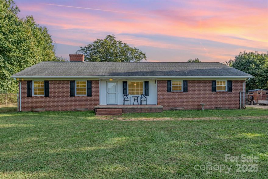 Charming 3-bedroom, 1.5-bath home nestled on a spacious 1.9-acre lot in peaceful China Grove! This property offers a functional layout featuring a bright sunroom, an unfinished basement with great potential for storage or future expansion, and a convenient carport. Enjoy outdoor living with a fully chain-link fenced backyard, perfect for pets or play, and an above-ground pool that will remain with the property. Beyond the backyard, you’ll find a small pasture ideal for small livestock. A unique nature trail provides direct access from the road to the pasture, allowing easy entry without driving through the fenced yard. This property offers a wonderful blend of comfort, space, and versatility with room to enjoy both indoor and outdoor living.