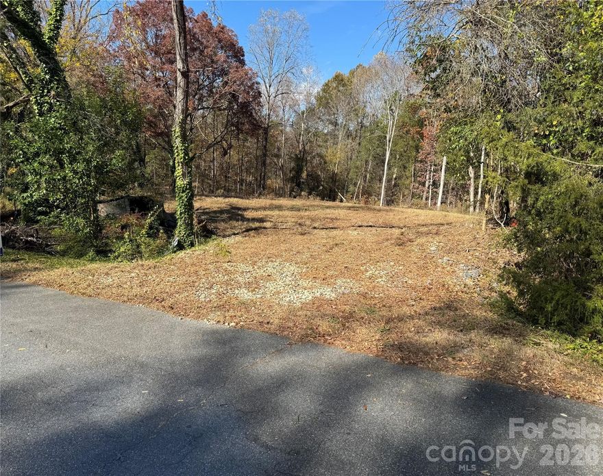 Bring your Builder! Mostly cleared 2.496 Acre Lot with gentle slope in back down to a small creek. Dead end road of nice established homes. NO HOA!  Centrally located near Rt. 73 and Odell School Road! Only Minutes to I 85, Afton Village, and Concord.  Appox 10 Miles to Huntersville, Davidson, and Kannapolis.  Lot is mostly cleared and easy to walk too visualize your dream home!  Lot might be well suited for a basement home too! Survey, Soil and Perc tests have been completed in the past.  Seller had a 4 bedroom perc completed and home planned for the lot. See attachments for details. Lot CAN NOT be subdivided.  Listing includes lots 23 and 24.  This is a fantastic opportunity to own a rare 2.496 Acre Lot in a great location!  (Floor Pan and Site Plan shown are from sellers intended home build. Please consult your builder. Plan 142-1218 Modern Farmhouse)