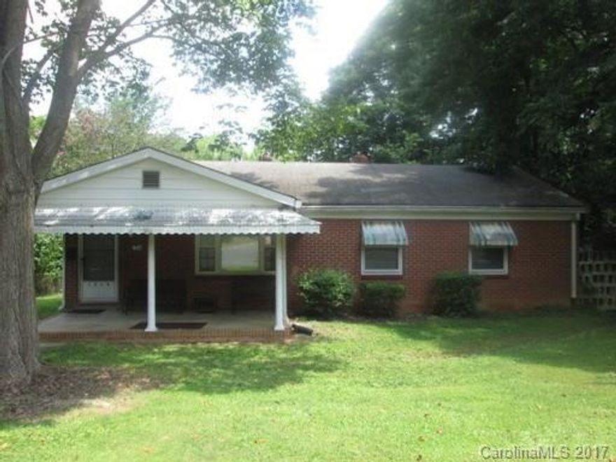 Well maintained ranch home with hardwood and ceramic tile floors. Fenced yard and 2 car detached garage storage. 5 minutes from I-77 and 10 minutes from uptown Charlotte.