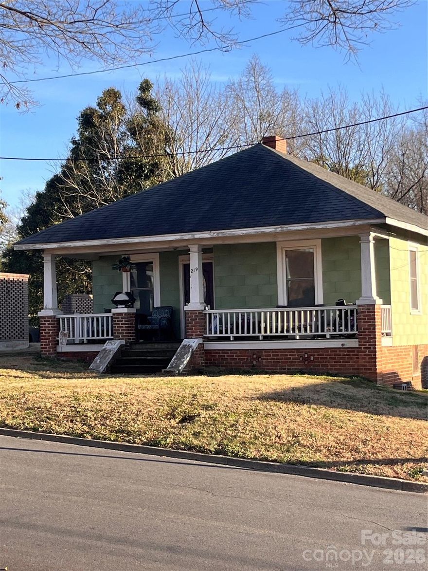 Calling all investors and renovation lovers! This 1915 Albemarle cottage is a prime opportunity in a highly desirable, walkable location. Just minutes from downtown, the YMCA, parks, and local amenities, this property offers both charm and convenience.

The home features 3 bedrooms, 1 full bath, high ceilings, and a spacious fenced backyard with a beautiful deck — perfect for outdoor living. A brand new HVAC system with new ductwork has already been installed, giving you a major head start on your renovation. Appliances are included!

An almost brand new 12x20 outbuilding adds even more value and flexibility — ideal for a she shed, man cave, workshop, or studio.

With endless potential, this diamond in the rough is ready to be transformed into something special. Don’t miss your chance — schedule your showing today!
