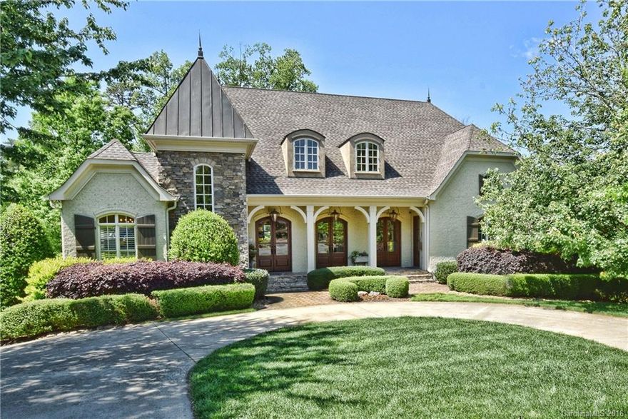 Interior Designer's home-custom built by Chris Kearns!  Brick & stone French styled-fabulous open fl plan! Prof chef kitchen/HUGE walnut island open to GR w/stone FP, DR, Library, Office, Scrd porch & terrace. Mstr suite-main/spa bath, WIC. Mudroom w/built-in lockers. Upper lvl: 3 bed w bonus! LL- entertainers DREAM, Bar, Billiards, Media, Guest suite, HUGE covered porch w/ Grill/FP, Saltwater POOL/Hot tub, and privacy! 3-car garage/.77 acre lush lot/Cul de sac. Stunning-once in a lifetime home!