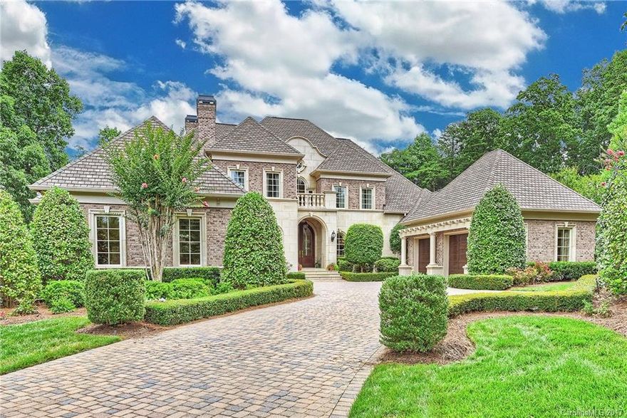 Nestled on the waterfront in The Peninsula this outstanding residence is designed for both personal relaxation & vibrant entertaining. Exquisitely appointed throughout & meticulously maintained with glass walled wine room, luxurious master suite & bath, screened porch w/ grill. Chef's kitchen with double islands and professional grade appliances. Lower level has entertainment bar, phenomenal theater, sauna. 4 car garage, outdoor fireplace & private pier. Home being sold furnished.