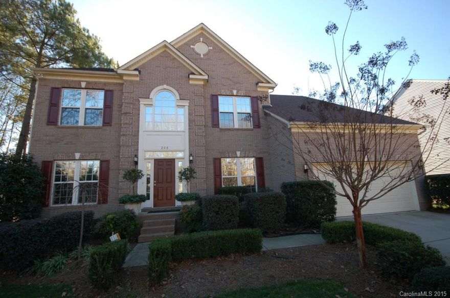 Gorgeous home located in Sunset Point subdivision on Lake Wylie, an inviting lakeside community in Rock Hill, SC, with park and community pool overlooking the lake. 8 miles from I-77 with easy access to Charlotte.  Brick and vinyl home features beautiful new dark wide plank hardwood floors, 2-story foyer with formal living and dining rooms, kitchen with an island, white granite counter tops, backsplash, new GE profile series stainless appliances and gas cooktop. Laundry room is off kitchen.
