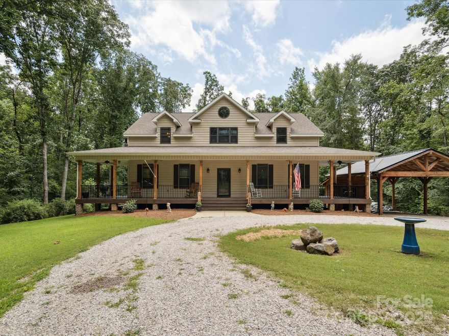 Discover this exquisite 3BR/2.5BA on 9+ acres in the peaceful countryside of Clover, SC! Immerse yourself in this upscale retreat with a rustic flare! The open airy floor plan is perfect for entertaining! The living room's focal points are a grand brick fireplace, dramatic vaulted ceilings and a picturesque view of your meticulously manicured grounds! There is an abundance of cabinet and counter space in the kitchen crafted for a culinary artist! Rest and relax in the oversized primary suite w/ walk in shower, 2 sinks and walk in closet!  Also on the main floor is a laundry room, formal dining, breakfast area, half bath and storage! Upstairs are 2 more bedrooms with large walk in closets, loft and full bath! Outside enjoy all four of our sweet southern seasons from the wrap around front porch, expansive screen porch or patio! The custom crafted carport has storage and place for 2 large vehicles! Hurry home to 820 King Road!