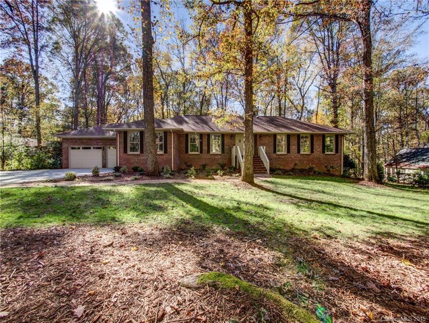 Completely remodeled  home in the beautiful gated golf community of River Hills. Home features 5 Bedrooms and 3 bathrooms, a huge great room with a stacked stone fireplace. This home features new hardwoods, tile and  carpet. New windows, new kitchen with granite counter tops, custom cabinets and SS appliances. A huge basement with an entertainment bar, Basement features a family room with a stacked stone fireplace bonus area with built in cabinets and shelves and large office. THIS IS A MUST SEE