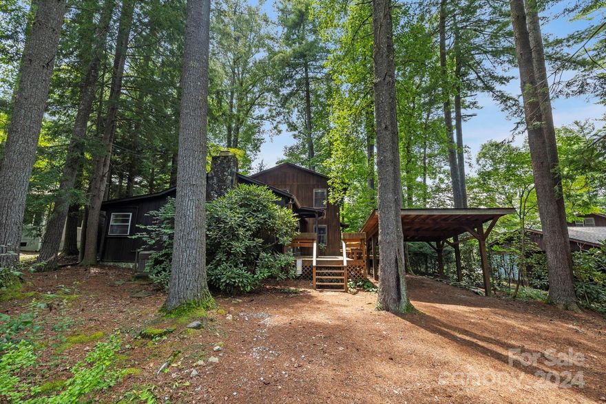 Rare opportunity to own a classic Bonclarken cottage in the heart of Flat Rock. With 4 Bedrooms and 3 Bathrooms in the main house and an additional bedroom and bath in the guest house, there is plenty of room to spread out. This home also boasts a workshop area and plenty of storage space.  Activities abound - Conference Center owned amenities are available to the homeowners - swimming pool, small lake, tennis courts and a playground.  Bonclarken is also a great area to walk and less than a mile to the Flat Rock Playhouse, Carl Sandburg Home and Flat Rock Village. Check out https://bonclarken.org/ for more information on the community.  Only $175/quarter paid for road maintenance and common area upkeep. Short term rental allowed.