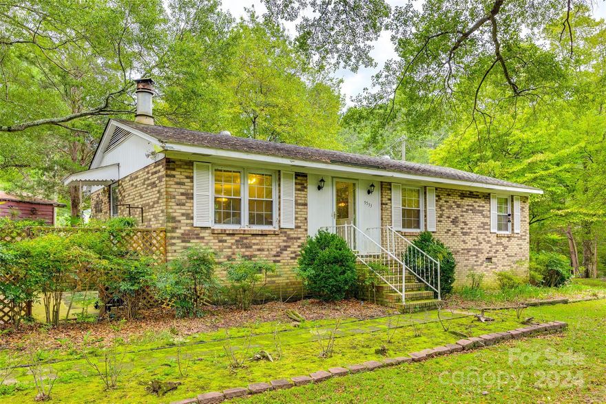 Looking for a place OFF GRID, but don't want a lengthy commute to modern conveniences?  Look no further!  This hidden gem is waiting to be discovered!  In need of new owners and fresh ideas, this intimate all brick ranch has so much potential.  A picturesque corner lot with 1.75 acres in total.  Four access points, three of which are gated.  Majestic trees are scattered throughout, offering a generous canopy.  Owner has a chicken coup and three carports that will convey.  
A separate manufactured singlewide will convey at no cost.  It is currently being used for storage.  With a little imagination, it could be spruced up to rent as an additional source of income, or perhaps converted to a She Shed or Ultimate Man Cave!  
This property is perfect for those who can see the potential and value in such a coveted location!