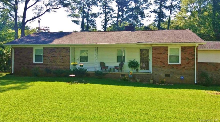 Move-in ready and minutes to I-77! This 4 bedroom, 2 bath brick home is perfect for commuters and also convenient to shopping and downtown. Mostly remodeled with newer roof, HVAC unit, electric panel, alarm system, windows, gutters (with leaf screens) and hard wired smoke detectors. This home sits on almost ½ acre and the long driveway provides plenty of parking for family and friends.