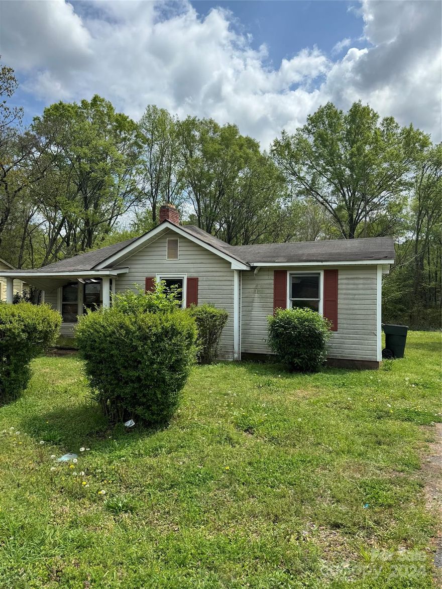 Situated near Downtown Rock Hill, this 2-bedroom, 1-bathroom property presents a straightforward opportunity for renovation enthusiasts. Set on an oversized lot, it offers substantial outdoor space, providing a blank slate for landscaping or a simple, functional yard. The home itself, in need of a comprehensive remodel, is ideal for those ready to tackle a project from the ground up. Its proximity to the conveniences and attractions of Rock Hill adds practical value. This property is well-suited for someone with a vision for transformation, or an investor looking for a renovation project. It’s a chance to create something new in a growing area, with the benefit of being close to the city’s amenities.