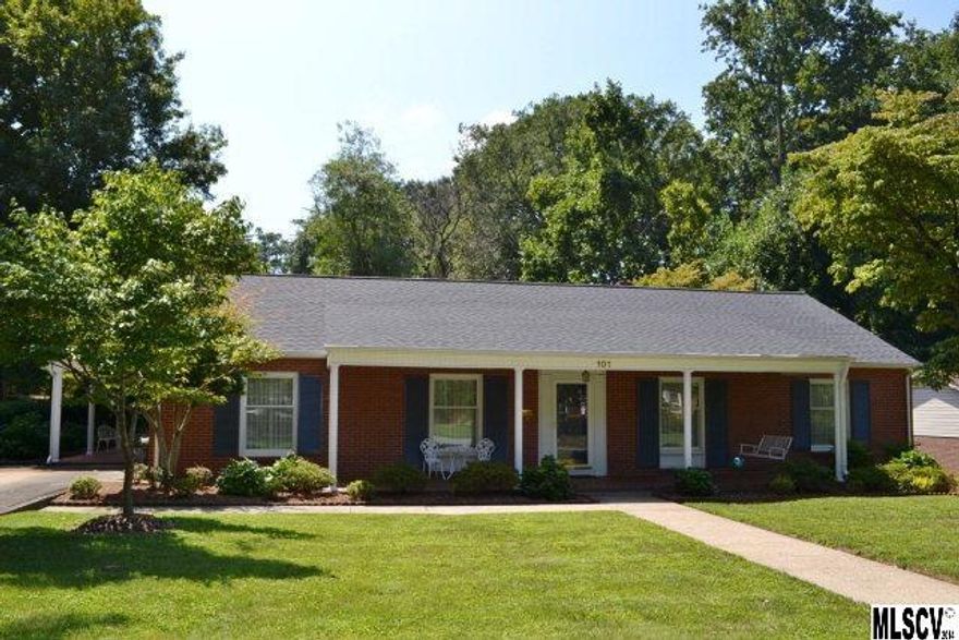 Well loved and beautifully maintained one-level brick home in very desirable West Park/Riverside area of downtown Morganton. Spacious, light filled rooms with oversized windows. New plumbing in April 2013, new architectural shingle roof in February 2013, and new Pella windows in September 2012. Outdoor living includes columned front porch, covered side porch with cracked tile floors, just-the-right-size backyard, and patio complete with picnic table that stays. High crawlspace area offers some storage. Dishwasher does not work.