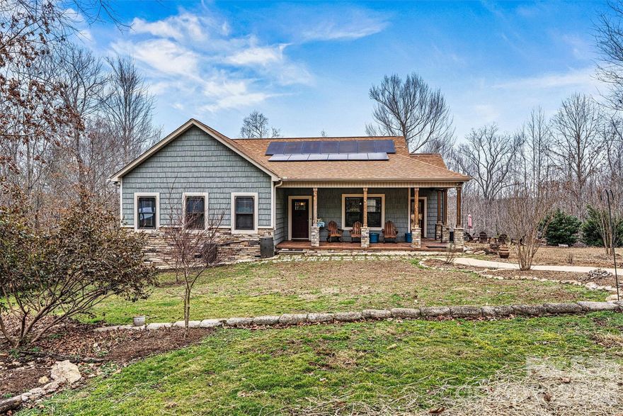 Welcome Home to 3108 Arden Way — With over 6.3 Acres Where Nature, Comfort, and Convenience Meet.

Discover the perfect blend of privacy, craftsmanship, and natural beauty nestled in Eastlake Estates.  This stunning custom-built Craftsman home is a true outdoor enthusiast’s retreat—where peaceful surroundings and thoughtful design come together in perfect harmony.

As you approach the front entry, the wraparound porch sets the tone for what awaits inside. Whether adorned with rocking chairs, seasonal décor, or the simple glow of evening light, it creates a warm first impression and a charming place to relax, gather, and savor the beauty that surrounds you. Step inside to an inviting open-concept floor plan highlighted by vaulted ceilings, where striking accent beams create a warm focal point in the main living area. Natural light pours in, enhancing the bright, airy atmosphere that is equally suited for quiet evenings at home or lively gatherings with friends. At the heart of this home, the thoughtfully designed kitchen anchors the home with style and function, while the open dining area welcomes both formal celebrations and everyday moments—creating a warm setting for connection and lasting memories.

The primary suite is a cozy personal retreat designed with comfort in mind. It features a walk-in closet and a private bath, creating a calming space to unwind with a soaking tub and a beautifully tiled walk-in shower—truly an inviting spot to relax and recharge at the end of the day. 

Two additional bedrooms and a full bath provide comfortable accommodations for family and guests alike, thoughtfully arranged for privacy and convenience. A large laundry room, complete with a walk-in pantry and half bath, adds practicality while keeping the home’s layout seamless and functional.

Step outside and experience the true magic of this remarkable property. Surrounded by nature, the expansive views and open space offer endless opportunities for outdoor living. Enjoy morning coffee on the porch as the sun rises, host memorable gatherings under open skies, or unwind in the evening while taking in sweeping sunset views across your private landscape. With over 6.3 acres to call your own, this property becomes a natural playground—perfect for exploring, gardening, or simply savoring the peace and serenity of a tree lined canopy.

Eco-friendly efficiency meets modern living, while solar panels help reduce energy costs while supporting sustainable living. Enjoy the benefits of lower utility bills and a home designed with both comfort and environmental responsibility in mind—perfectly complementing the beauty and functionality of this remarkable property.  Reliable Power, equipped with a whole-home generator, ensuring uninterrupted comfort and peace of mind even during power outages.

Convenience is key, yet effortless with easy access to I-40, Hwy 16 and more.  Located just 50 miles from Charlotte Douglas International Airport, travel and commuting are a breeze—offering the perfect harmony of serene, private living with seamless access to regional and international destinations.

This is more than a home. It’s an experience. A retreat. A place where everyday living feels extraordinary. Don't miss this rare opportunity, schedule your private tour today!