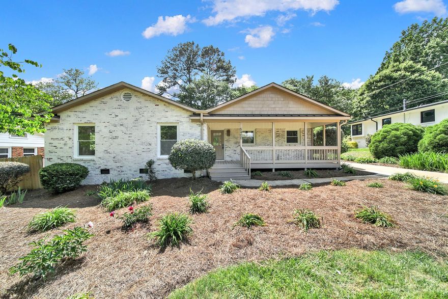 Completely remodeled brick ranch in desirable Montclaire! This fully-renovated home features updated electrical and plumbing, fresh paint, site-finished hardwoods, and designer fixtures and finishes throughout. Open concept kitchen/living/dining space featuring two-tone shaker cabinets, quartz countertops, oversized island, and stainless appliances with gas range. Adjacent sunroom would make the perfect office, playroom, or formal dining space! Primary bedroom features ensuite bath with walk-in closet and incredible tiled shower. Two secondary bedrooms and additional full bathroom with double vanity and fully-tiled tub/shower combo. Large fenced backyard with storage shed and concrete patio make this home great for entertaining!